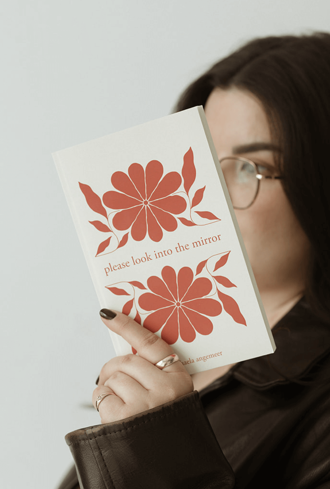 please look into the mirror poetry book by michaela angemeer