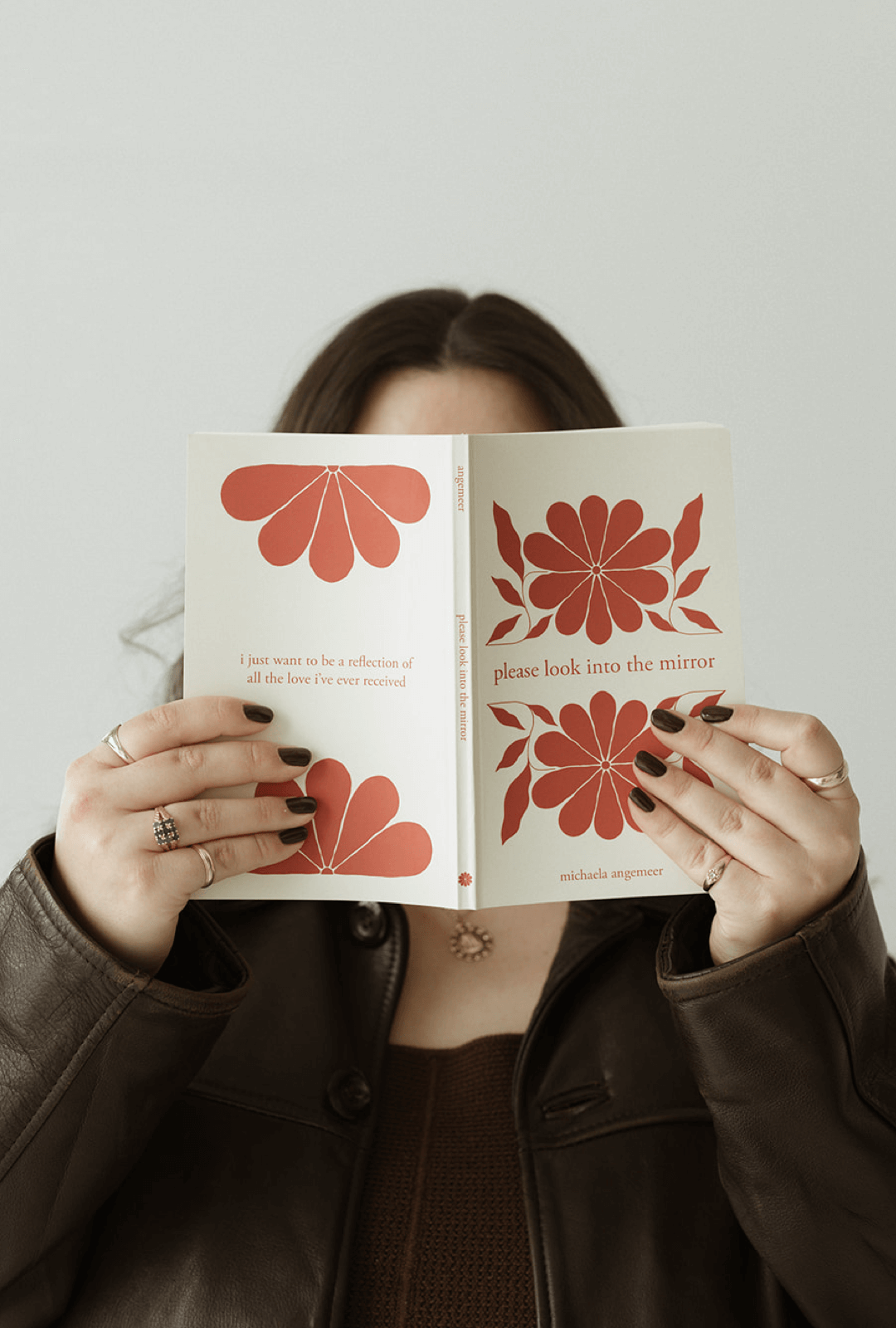 please look into the mirror poetry book front and back cover by michaela angemeer